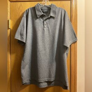 Men’s Consensus Classic Gray Short Sleeved Polo Shirt with Brown Buttons.